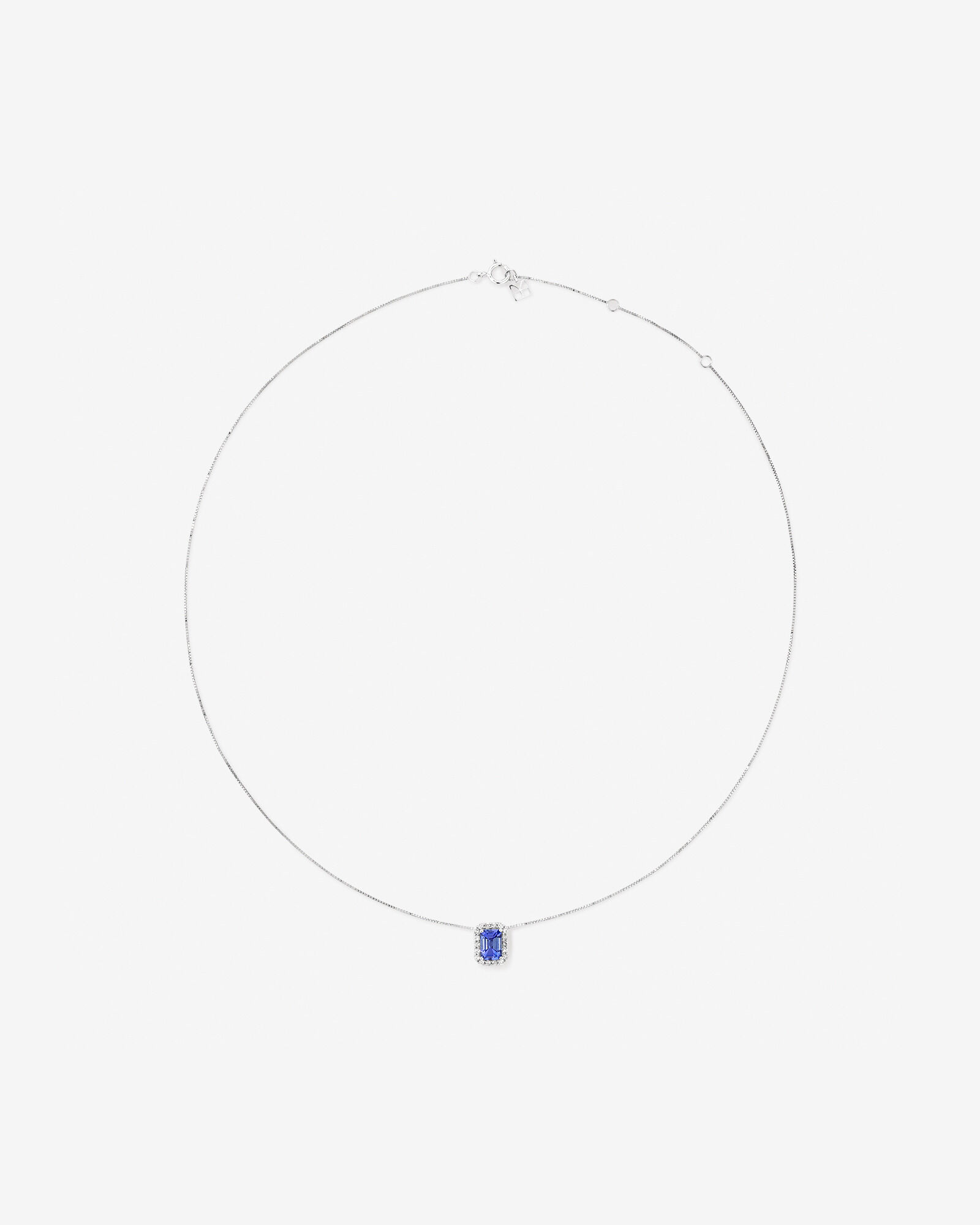 Emerald Cut Blue Tanzanite and 0.17 Carat TW Diamond Halo Pendant in 14kt White Gold