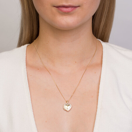 Heart Locket in 10kt Yellow Gold & Sterling Silver Heart Locket in 10kt Yellow Gold & Sterling Silver