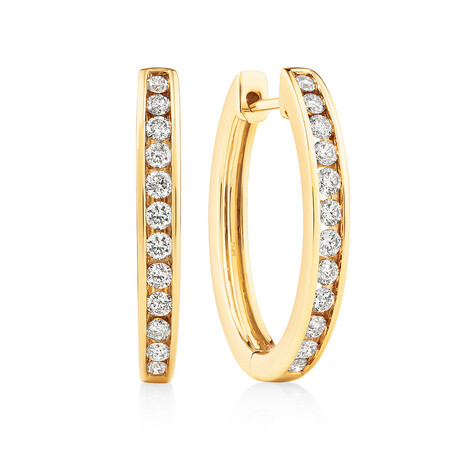 Huggie Earrings with 0.50 Carat TW of Diamonds in 10kt Yellow Gold Huggie Earrings with 0.50 Carat TW of Diamonds in 10kt Yellow Gold