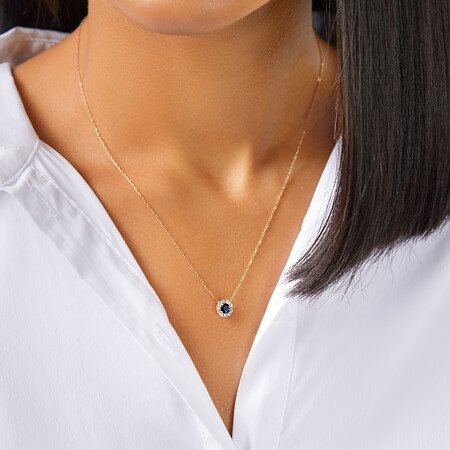 Halo Pendant with Sapphire & 0.14 Carat TW of Diamonds in 10kt Yellow Gold Halo Pendant with Sapphire & 0.14 Carat TW of Diamonds in 10kt Yellow Gold