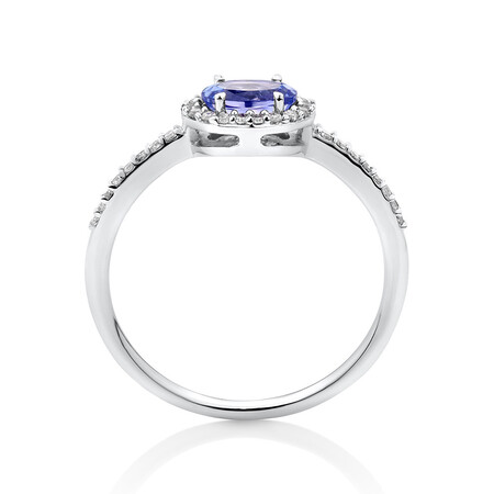Halo Ring with Tanzanite & .15 TW Carat Of Diamonds in 10kt White Gold Halo Ring with Tanzanite & .15 TW Carat Of Diamonds in 10kt White Gold