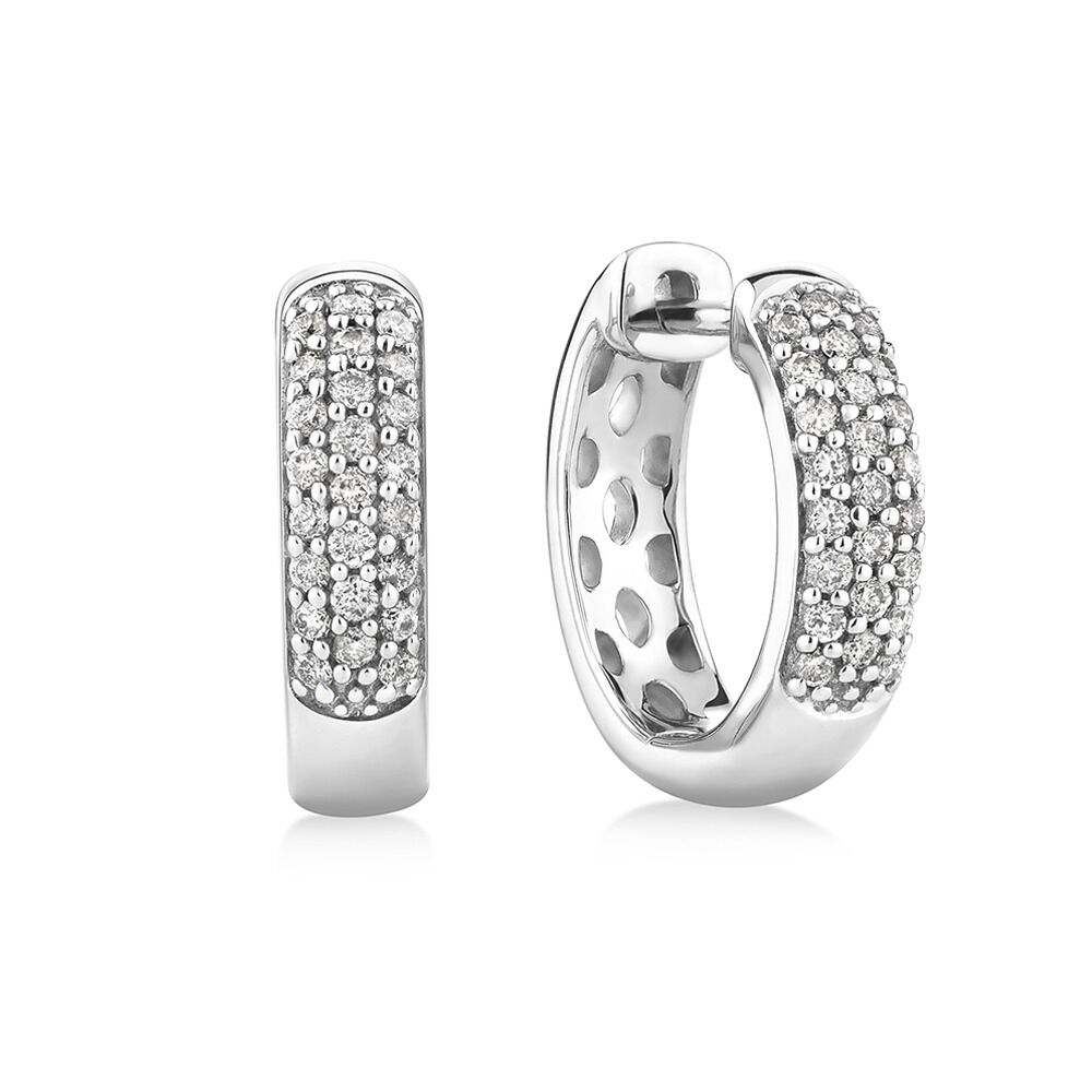 Huggie Earrings With 1 4 Carat TW Of Diamonds In 10kt White Gold