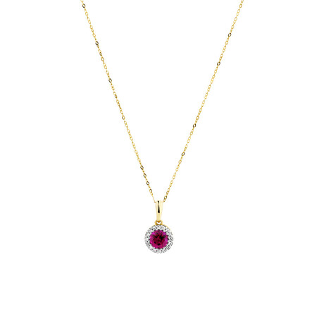 Halo Pendant with .09 Carat TW of Diamonds in 10kt Yellow Gold Halo Pendant with .09 Carat TW of Diamonds in 10kt Yellow Gold