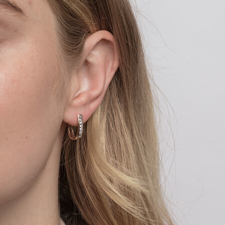 Huggie Earrings with 0.25 Carat TW of Diamonds in 10kt Yellow Gold Huggie Earrings with 0.25 Carat TW of Diamonds in 10kt Yellow Gold