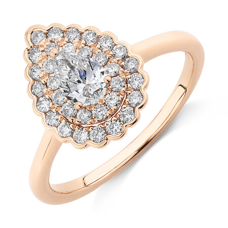 Evermore Halo Engagement Ring with 0.75 Carat TW of Diamonds in 14kt Rose Gold Evermore Halo Engagement Ring with 0.75 Carat TW of Diamonds in 14kt Rose Gold