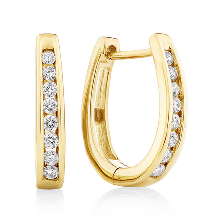Huggie Earrings with 0.25 Carat TW of Diamonds in 10kt Yellow Gold Huggie Earrings with 0.25 Carat TW of Diamonds in 10kt Yellow Gold