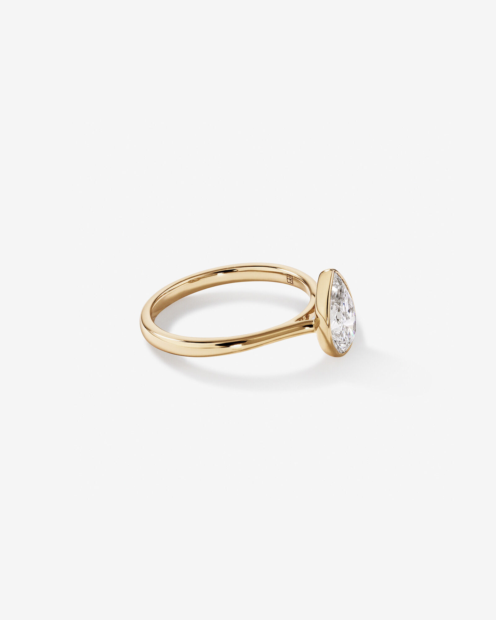 1.25 Carat TW Pear Cut Laboratory-Grown Diamond Solitaire Bezel Set Engagement Ring in 14kt Yellow Gold