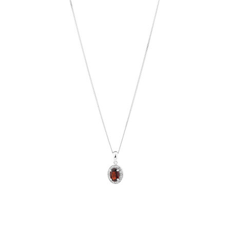 Halo Pendant with Garnet and 0.04 TW of Diamonds in Sterling Silver Halo Pendant with Garnet and 0.04 TW of Diamonds in Sterling Silver