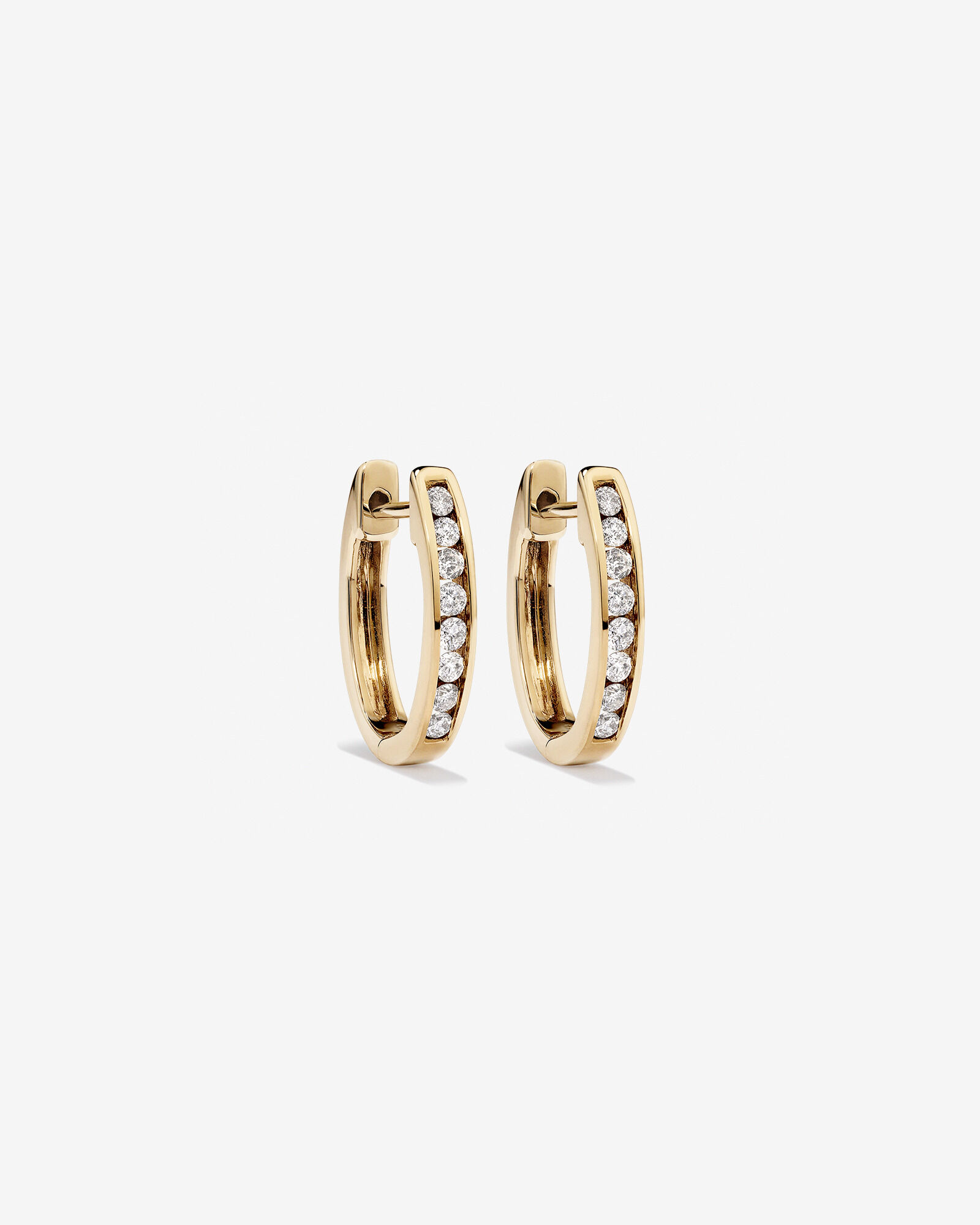 Huggie Earrings with 0.25 Carat TW of Diamonds 10kt Yellow Gold