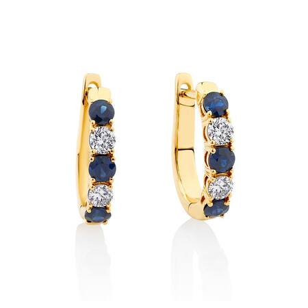 Hoop Earrings with 0.34 Carat TW of Diamonds in 10kt Yellow Gold Hoop Earrings with 0.34 Carat TW of Diamonds in 10kt Yellow Gold