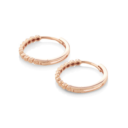 Huggie Earrings in 10kt Rose Gold Huggie Earrings in 10kt Rose Gold