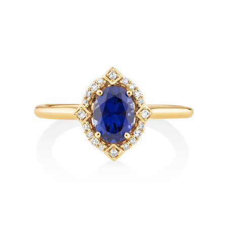 Ring with Created Sapphire & Diamonds in 10kt Yellow Gold Ring with Created Sapphire & Diamonds in 10kt Yellow Gold