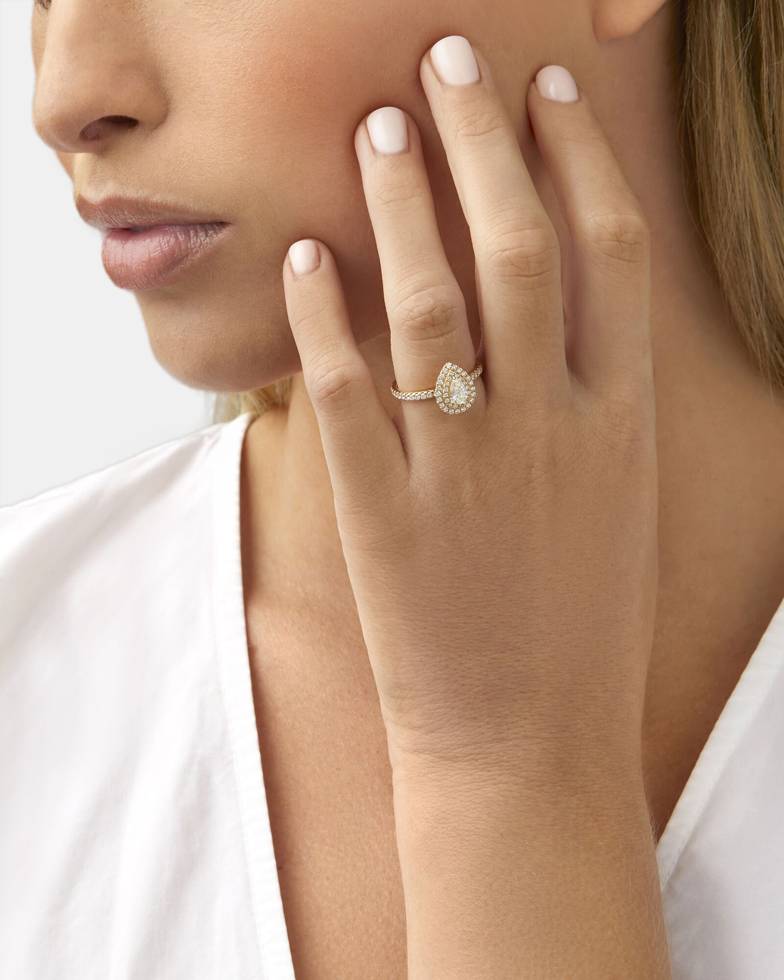 Double Halo Ring with 0.71 Carat TW of Diamonds in 18kt Yellow Gold