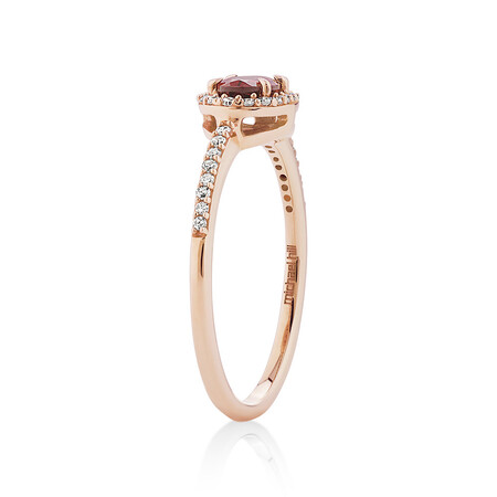 Halo Ring with Rhodolite Garnet & 0.15 Carat TW of Diamonds in 10kt Rose Gold Halo Ring with Rhodolite Garnet & 0.15 Carat TW of Diamonds in 10kt Rose Gold