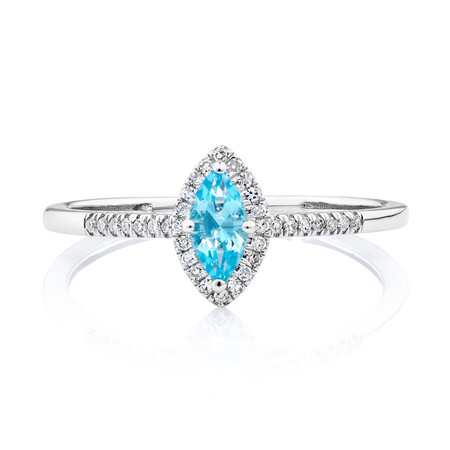 Ring with Blue Topaz & Diamonds in 10kt White Gold Ring with Blue Topaz & Diamonds in 10kt White Gold