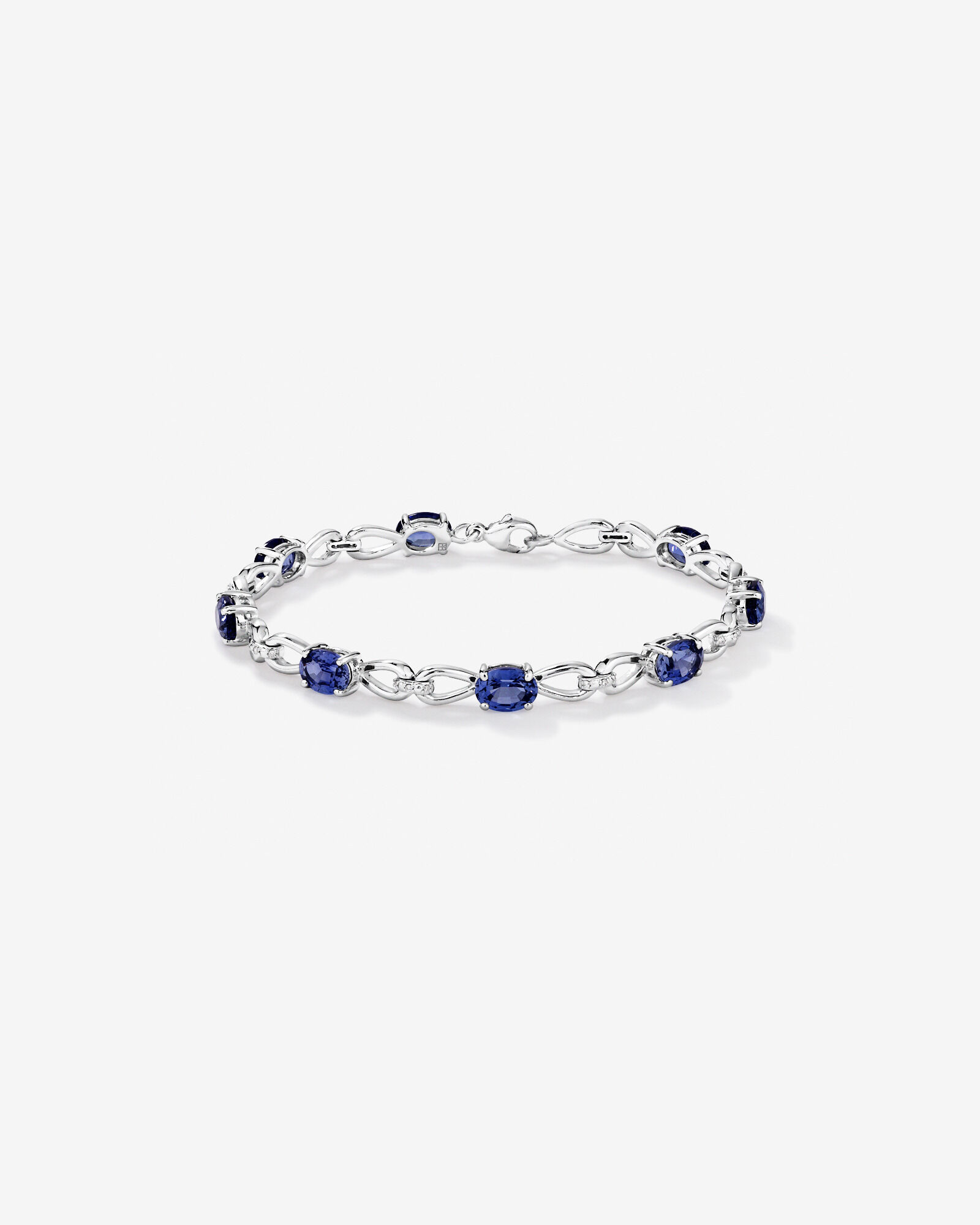 Oval Cut Blue Created Sapphire Gemstone and Diamond Bracelet in Sterling Silver