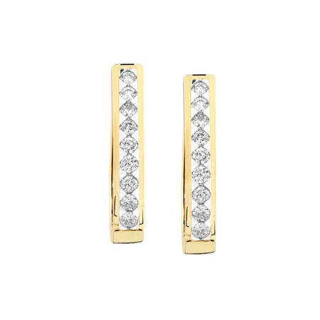 Huggie Earrings with 1/2 Carat TW of Diamonds ih 10kt White Gold