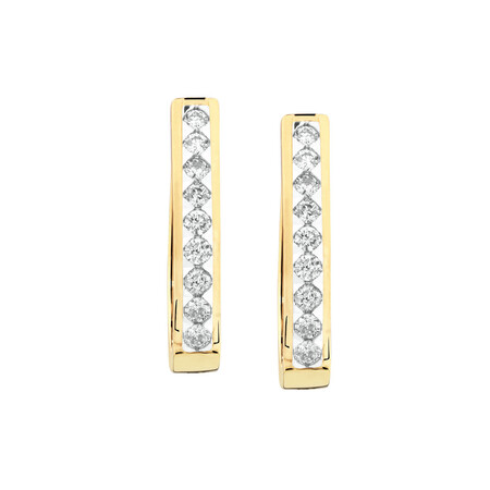 Huggie Earrings with 1/2 Carat TW of Diamonds ih 10kt White Gold Huggie Earrings with 1/2 Carat TW of Diamonds ih 10kt White Gold
