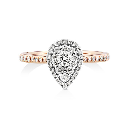 Evermore Halo Pear Engagement Ring with 0.45 Carat TW Diamonds in 10kt Rose & White Gold Evermore Halo Pear Engagement Ring with 0.45 Carat TW Diamonds in 10kt Rose & White Gold