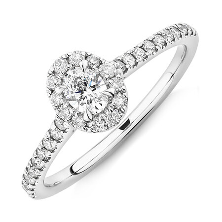 Oval Halo Ring with 0.50 Carat TW of Diamonds in 14kt White Gold Oval Halo Ring with 0.50 Carat TW of Diamonds in 14kt White Gold