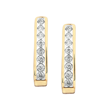 Huggie Earrings with 0.34 Carat TW of Diamonds in 10kt Yellow Gold