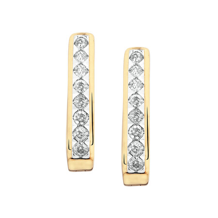 Huggie Earrings with 0.34 Carat TW of Diamonds in 10kt Yellow Gold Huggie Earrings with 0.34 Carat TW of Diamonds in 10kt Yellow Gold