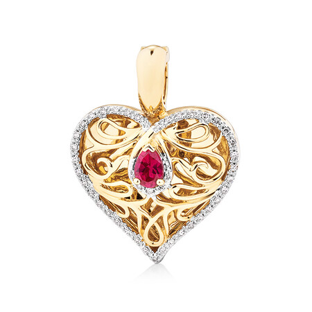 Heart Pendant with Created Ruby and 0.15 Carat TW of Diamonds in 10kt Yellow Gold Heart Pendant with Created Ruby and 0.15 Carat TW of Diamonds in 10kt Yellow Gold