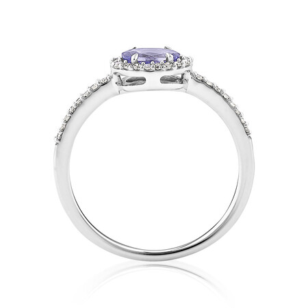 Halo Ring with Tanzanite & .15 TW Carat Of Diamonds in 10kt White Gold Halo Ring with Tanzanite & .15 TW Carat Of Diamonds in 10kt White Gold