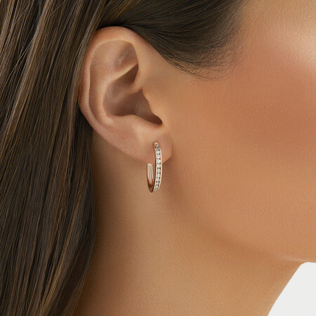 Huggie Earrings with 0.50 Carat TW of Diamonds in 10kt Rose Gold Huggie Earrings with 0.50 Carat TW of Diamonds in 10kt Rose Gold