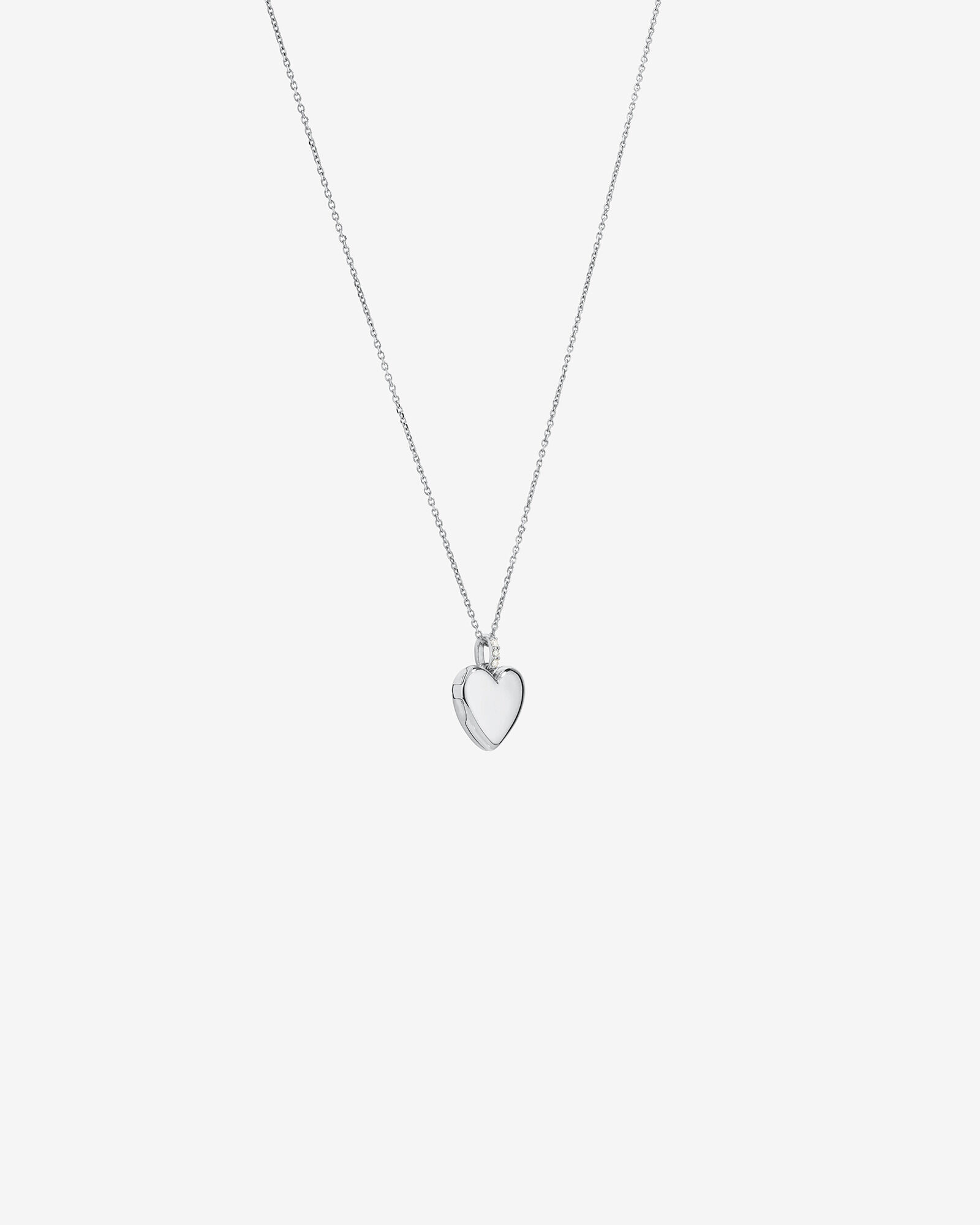 Diamond Accent Heart locket in Sterling Silver