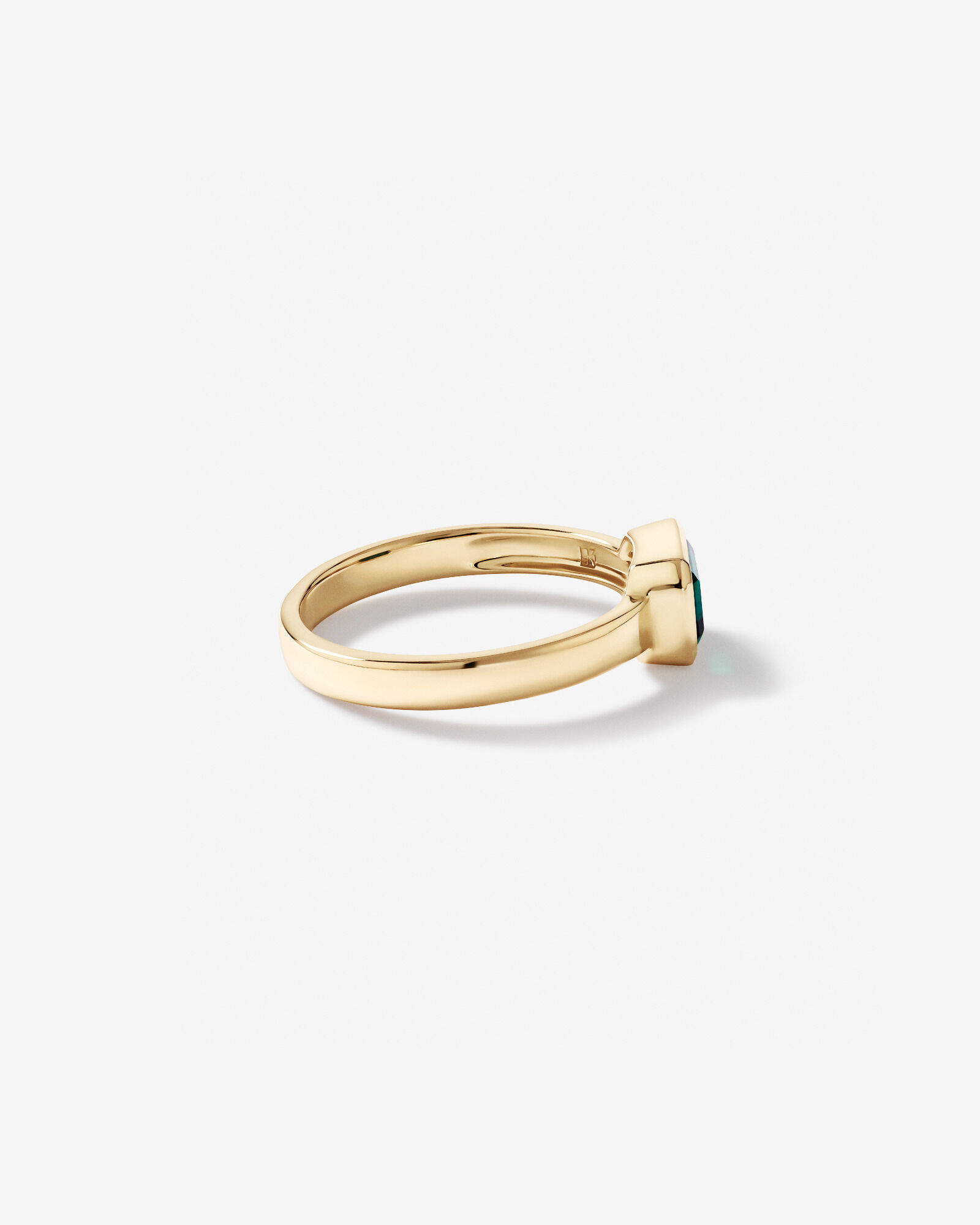 East-West Set Created Emerald Bezel Ring in 10kt Yellow Gold