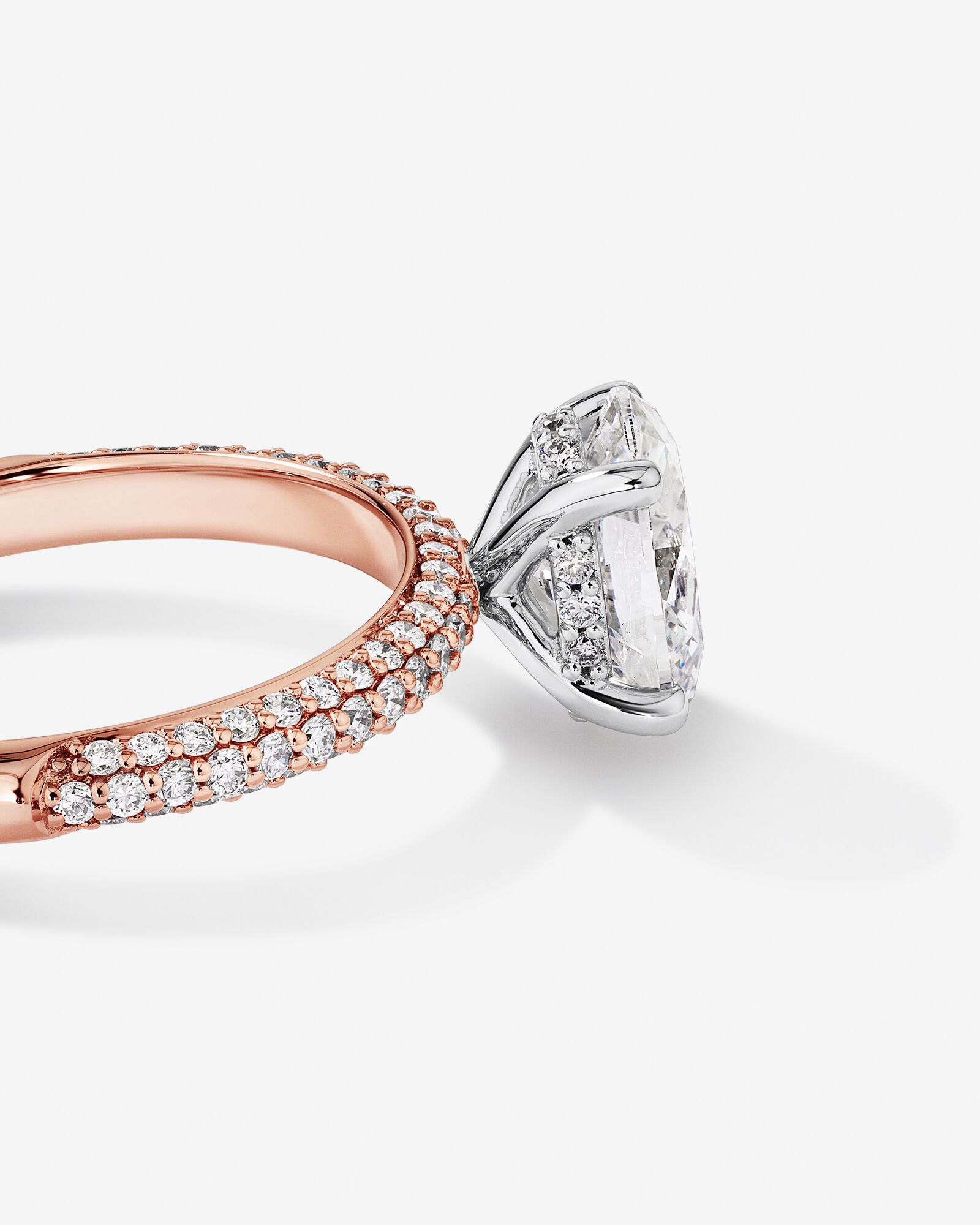 1.95 Carat TW Oval Cut Laboratory-Grown Diamond Solitaire Side Accent Engagement Ring in 14kt Rose and White Gold