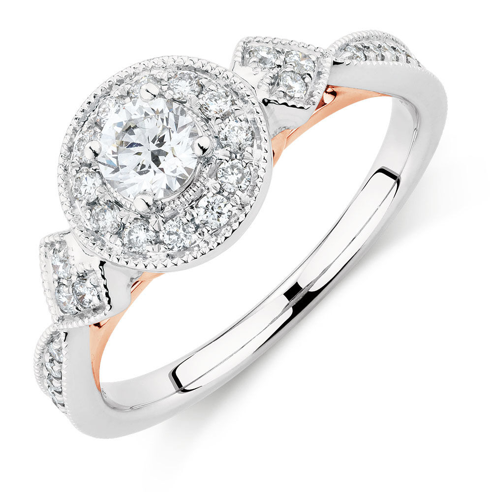 Sir Michael Hill Designer GrandAmoroso Engagement Ring with 0.58 Carat TW of Diamonds in 14kt White & Rose Gold