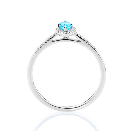 Ring with Blue Topaz & Diamonds in 10kt White Gold Ring with Blue Topaz & Diamonds in 10kt White Gold