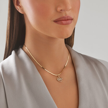 Lotus Motif Pendant with 0.15 Carat of Diamonds in 10kt Yellow Gold Lotus Motif Pendant with 0.15 Carat of Diamonds in 10kt Yellow Gold