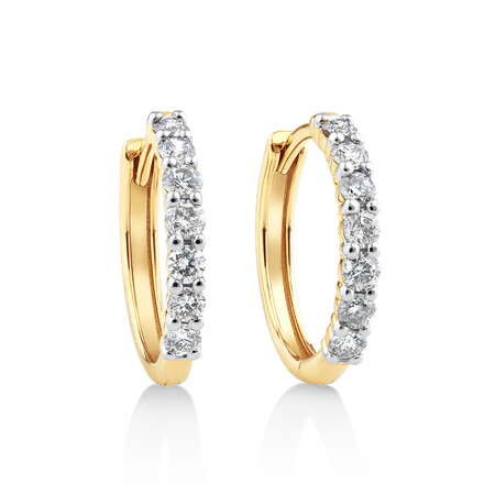 Huggie Earrings with 0.50kt TW Diamonds in 10kt Yellow Gold Huggie Earrings with 0.50kt TW Diamonds in 10kt Yellow Gold