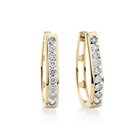 Huggie Earrings with 0.50 Carat TW of Diamonds in 10kt Yellow Gold Huggie Earrings with 0.50 Carat TW of Diamonds in 10kt Yellow Gold