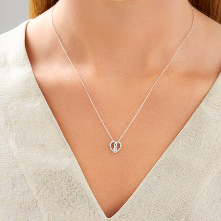 Mini Infinitas Pendant with 0.12 Carat TW of Diamonds in Sterling Silver Mini Infinitas Pendant with 0.12 Carat TW of Diamonds in Sterling Silver