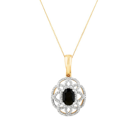 Pendant with Sapphire & .50 Carat TW of Diamonds in 10kt Yellow & White Gold