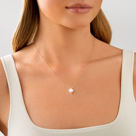 Pendant with Opal and Diamonds in 10kt Rose Gold Pendant with Opal and Diamonds in 10kt Rose Gold