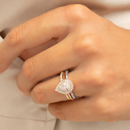 Evermore Halo Engagement Ring with 0.75 Carat TW of Diamonds in 14kt Rose Gold Evermore Halo Engagement Ring with 0.75 Carat TW of Diamonds in 14kt Rose Gold