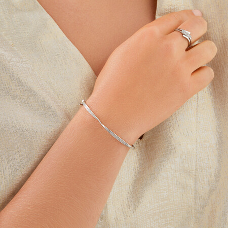 Twist Bangle with 0.20 Carat TW of Diamonds in Sterling Silver Twist Bangle with 0.20 Carat TW of Diamonds in Sterling Silver