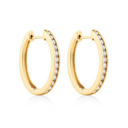 Huggie Earrings with 0.50 Carat TW of Diamonds in 10kt Yellow Gold Huggie Earrings with 0.50 Carat TW of Diamonds in 10kt Yellow Gold