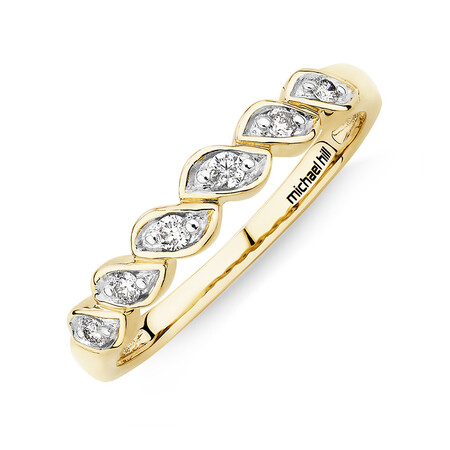Fancy Twist Ring with 0.10 Carat TW of Diamonds in 10kt Yellow Gold Fancy Twist Ring with 0.10 Carat TW of Diamonds in 10kt Yellow Gold