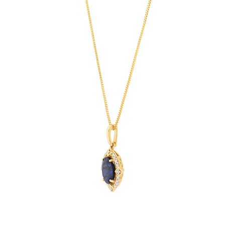 Pendant with Laboratory Created Sapphire & Natural Diamonds in 10kt Yellow Gold Pendant with Laboratory Created Sapphire & Natural Diamonds in 10kt Yellow Gold