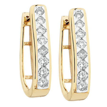 Huggie Earrings with 1/3 Carat TW of Diamonds in 10kt Yellow Gold Huggie Earrings with 1/3 Carat TW of Diamonds in 10kt Yellow Gold