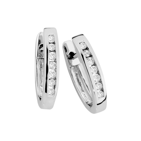 Huggie Earrings with 0.15 Carat TW of Diamonds in 10kt White Gold Huggie Earrings with 0.15 Carat TW of Diamonds in 10kt White Gold