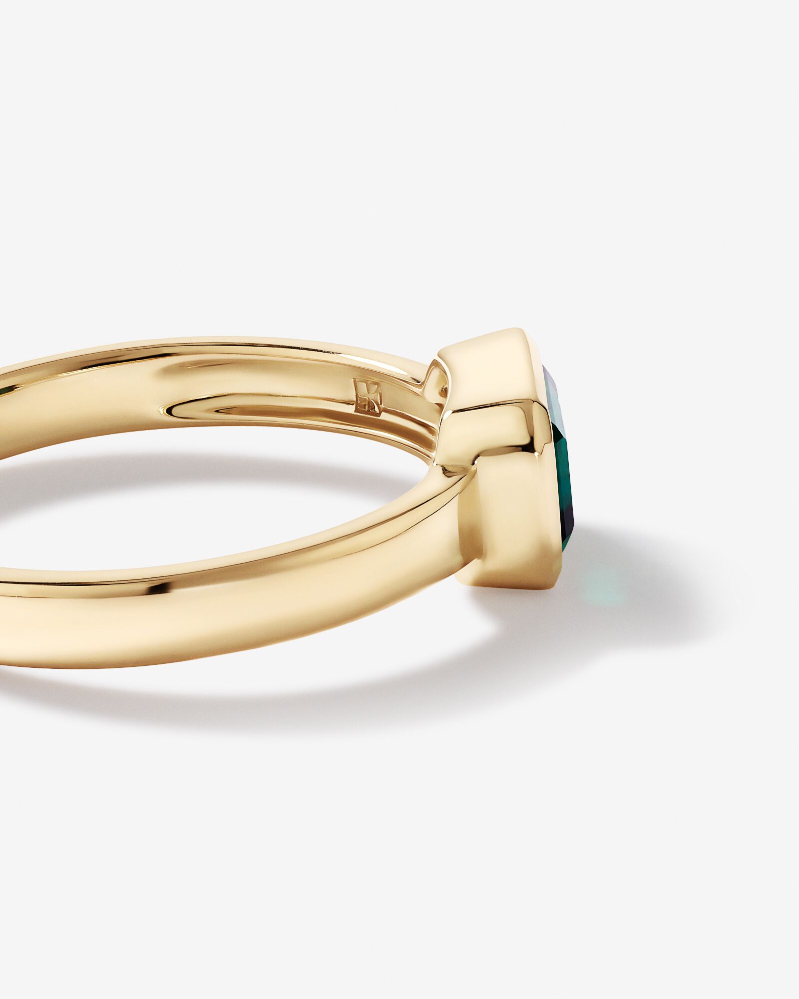 East-West Set Created Emerald Bezel Ring in 10kt Yellow Gold