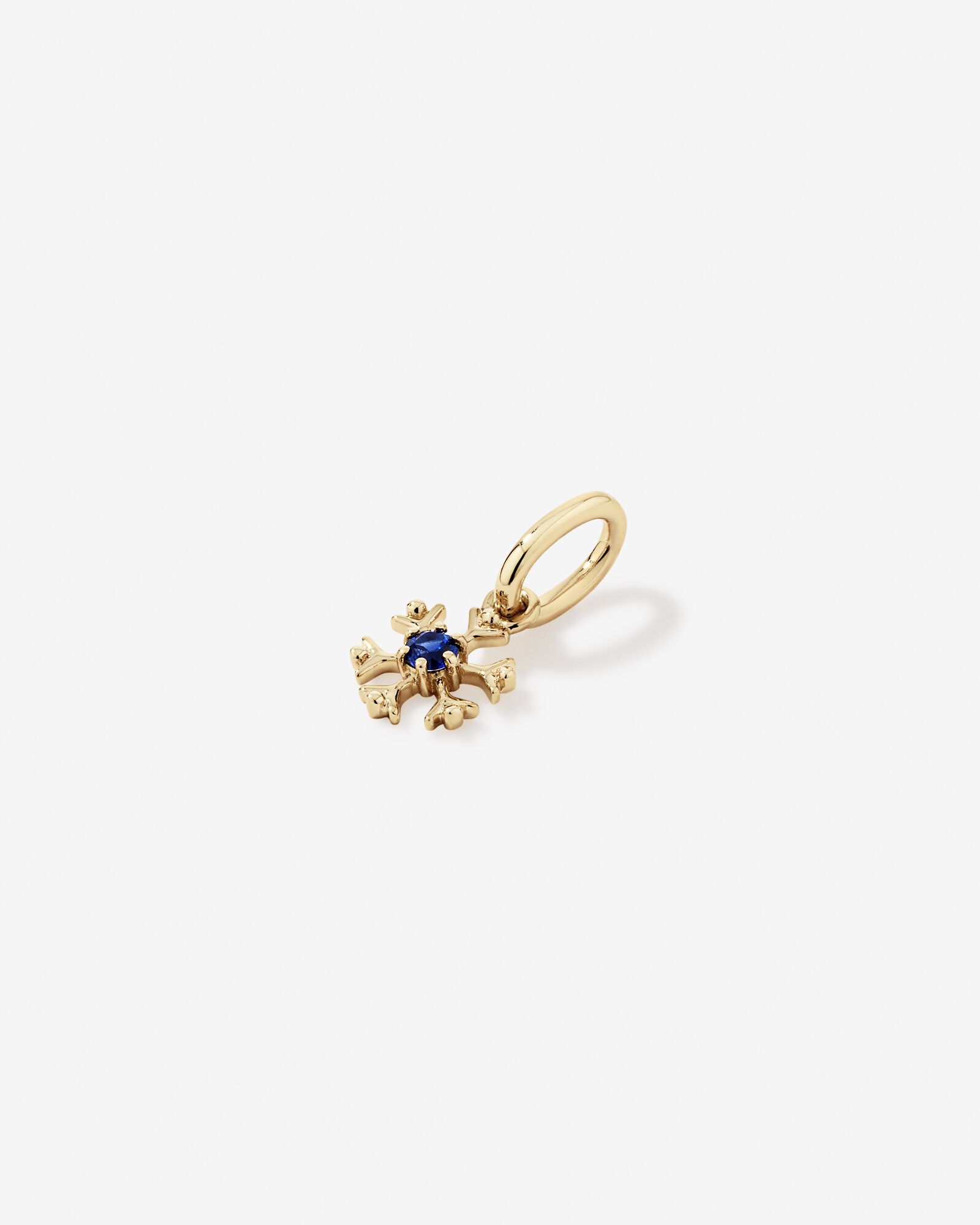 Snowflake Pendant with Round Created Sapphire in 10kt Yellow Gold
