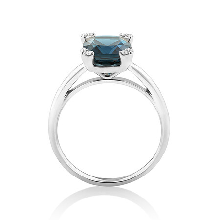 Ring with Blue Topaz & Diamonds In 10kt White Gold Ring with Blue Topaz & Diamonds In 10kt White Gold